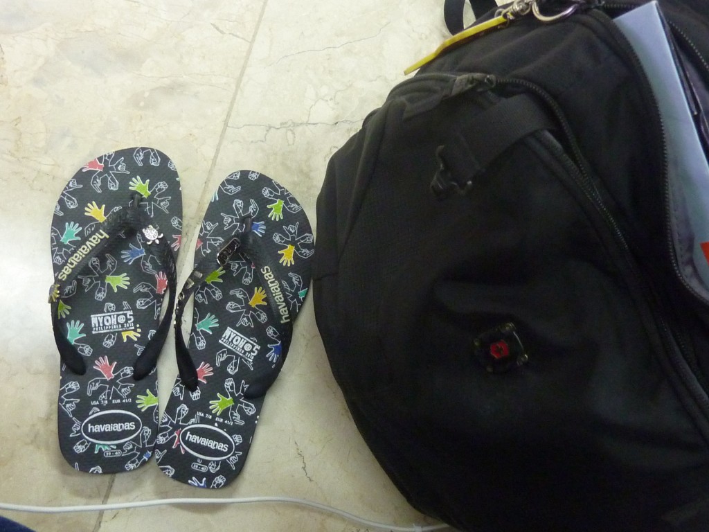 Cebu to Bacolod flight - my bag and Havaianas